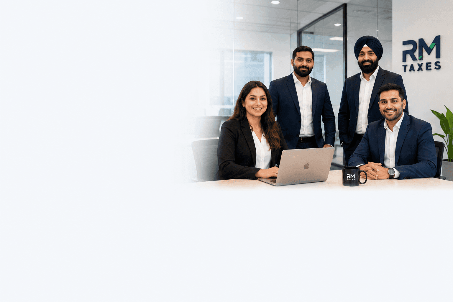The RM Business Solutions team in their office